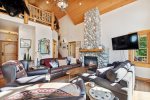Youll love the stone fireplace and large windows in the living area